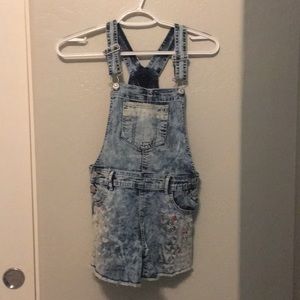 Kids jean jumper with colorful detailing.